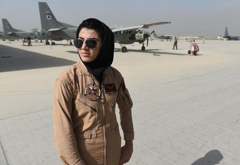 Afghanistan's first female fixed-wing pilot Niloofar Rahmani poses at an airfield in Kabul on April 26, 2015. Shah Marai / AFP