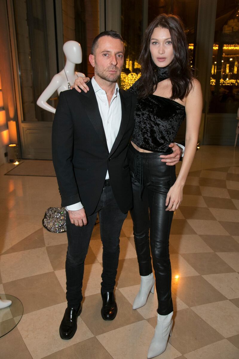 PARIS, FRANCE - JANUARY 24:  (L-R) Alexandre Vauthier and Bella Hadid attend the Swarovski Celebrates 10 Seasons X Alexandre Vauthier cocktail and dinner at Hotel Ritz on January 24, 2017 in Paris, France.  (Photo by Julien M. Hekimian/Getty Images)