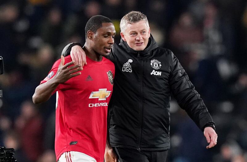 Manchester United manager Ole Gunnar Solskjaer celebrates with Odion Ighalo after the match. Reuters