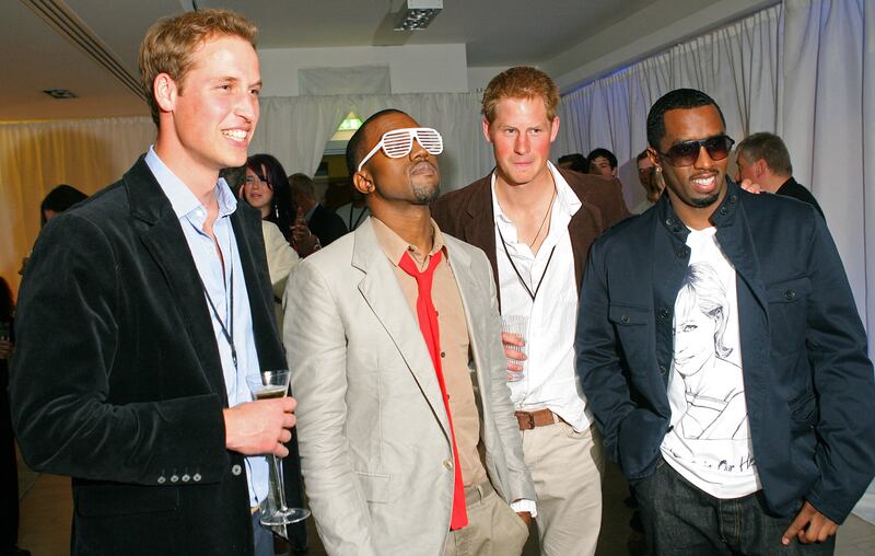 From left, Prince William, rapper Kanye West, Prince Harry and rapper P Diddy during a backstage party at Wembley Arena in London on July 1, 2007, at a memorial concert held for Princess Diana. AFP