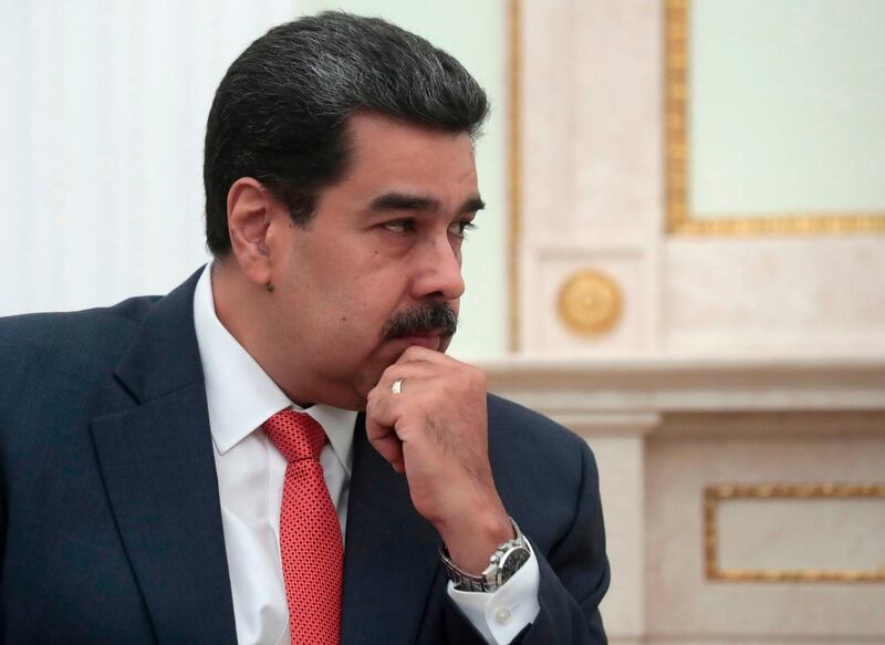 Venezuelan President Nicolas Maduro listens to Russian President during their meeting at the Kremlin in Moscow on September 25, 2019.  Welcoming the leftist leader at the Kremlin, Putin reiterated support for Maduro's regime but also indicated the Venezuelan president should be open to dialogue with his critics.
 / AFP / POOL / Sergei CHIRIKOV
