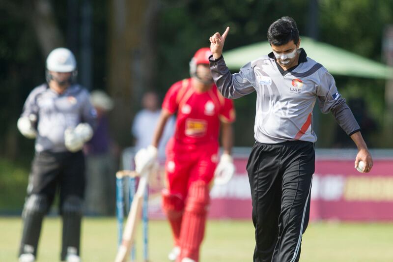 KING CITY, CANADA : August 6, 2013 UAE captain Khurram Khan gestures to a team mate as he prepares to bowl against  Canada during the one day international  at the Maple Leaf Cricket club in King City, Ontario, Canada ( Chris Young/ The National). For Sports *** Local Caption ***  chy211.jpg