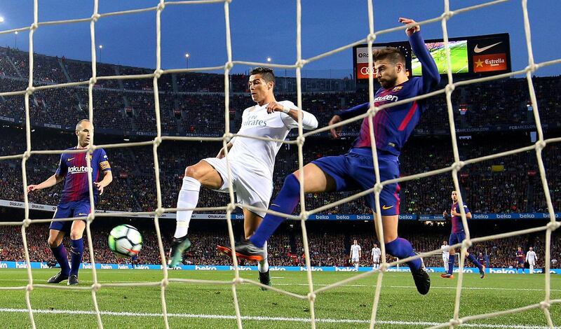 Real Madrid's Cristiano Ronaldo scores their first goal. Sergio Perez / Reuters