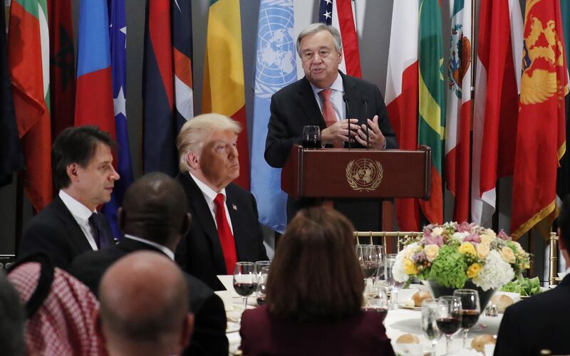 US President Donald Trump (L) sits next to UN Secretary General Antonio Guterres, right, as he speaks at the delegate luncheon on the sidelines of the General Debate of the General Assembly of the United Nations at United Nations Headquarters.  EPA