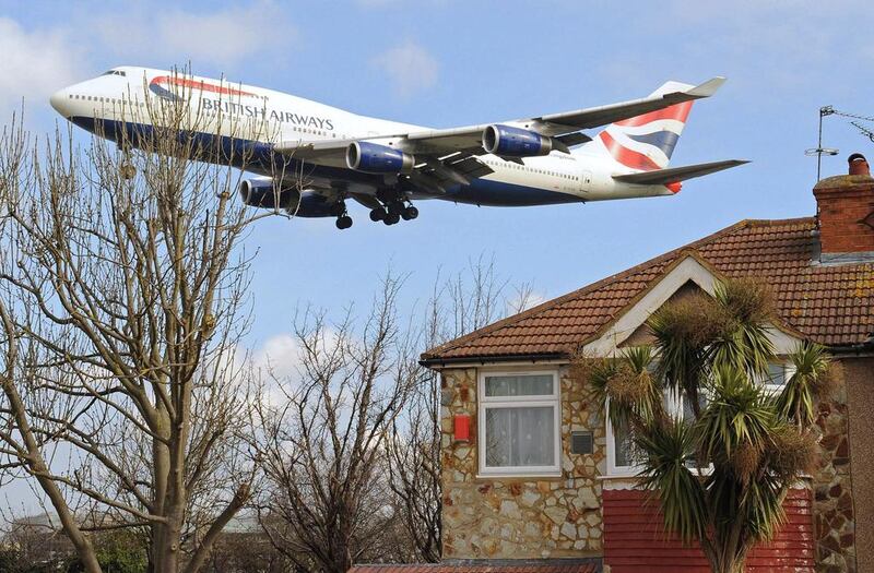 A British Airways aircraft descends to land at Heathrow Airport. Toby Melville / Reuters