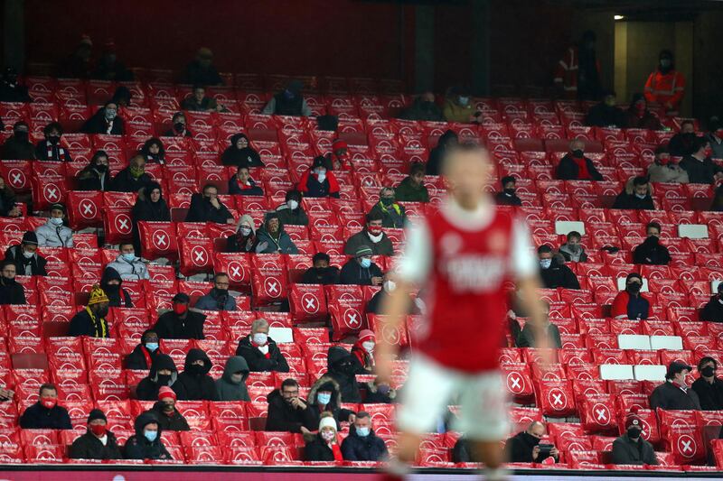 Arsenal fans socially distance in the stands during an English Premier League match between Arsenal and Burnley in London. AP Photo