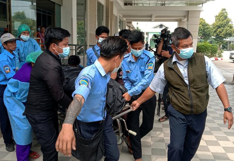 Medical personnel carry the body of the young woman protester Mya Thwate Thwate Khaing, 20, who was shot in the head last week as police tried to disperse a crowd, after she died in a hospital in Naypyitaw, Myanmar. REUTERS