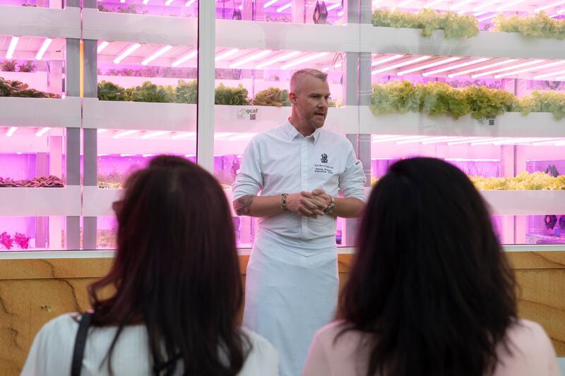 Executive chef Tobias Pfister conducts a tour of the vertical farm, which grows crops year–round with daily harvests of up to 10 kilograms of produce

