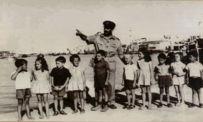 Flight Lt F Loughman and the founding class of Dubai English Speaking School in the area where the dry docks are now. Photo: Dubai English Speaking School