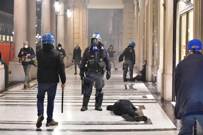 Clashes between demonstrators and police in Turin. EPA