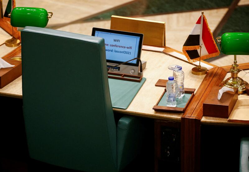 The empty chair of the Syrian delegate during the opening session of an Arab League meeting of foreign ministers in Cairo. Reuters