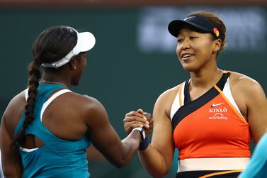 INDIAN WELLS, CALIFORNIA - MARCH 10: Naomi Osaka of Japan shakes hands at the net after her three set victory against Sloane Stephens of the United States in their first round match on Day 4 of the BNP Paribas Open at the Indian Wells Tennis Garden on March 10, 2022 in Indian Wells, California.    Clive Brunskill / Getty Images / AFP

