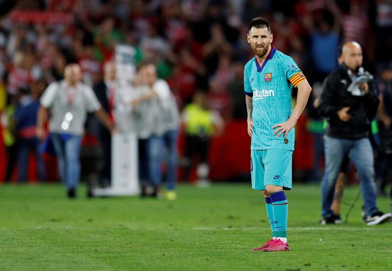 Barcelona's Lionel Messi looks dejected after the match. Reuters