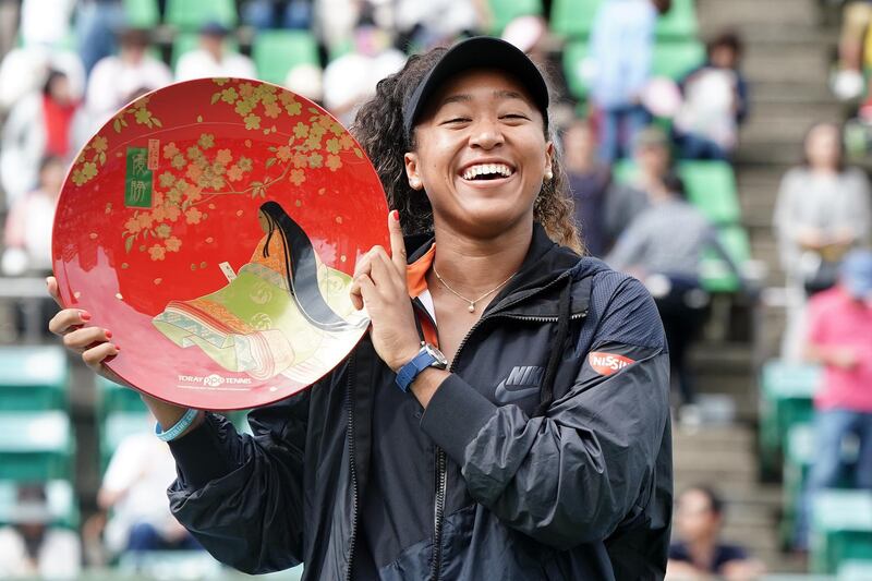 OSAKA, JAPAN - SEPTEMBER 22: Singles champion
Naomi Osaka of Japan poses for photographs with the trophy after the Singles final agains Anastasia Pavlyuchenkova of Russia during day seven of the Toray Pan Pacific Open at Utsubo Tennis Cent on September 22, 2019 in Osaka, Japan. (Photo by Koji Watanabe/Getty Images)