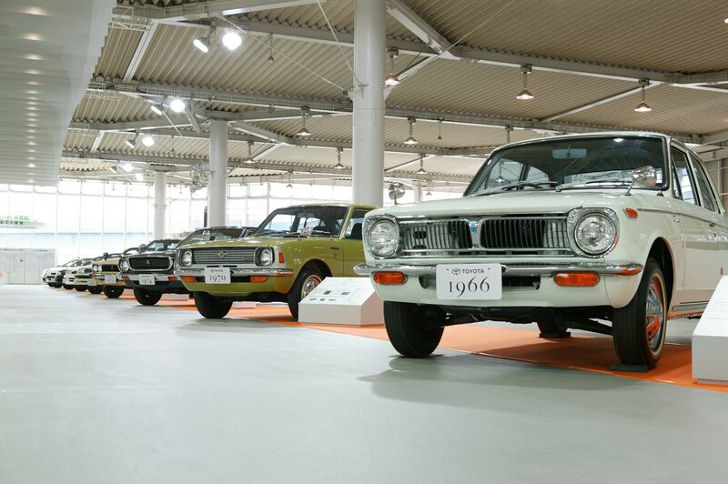 A historical collection of Corollas at Toyota's Tokyo showroom.