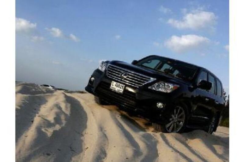 A cooler sits between the front seats of the LX570, providing a chilled thirst quencher when on a desert adventure.