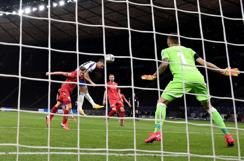 Hertha' s Vedad Ibisevic, second left, scores the opening goal. AP