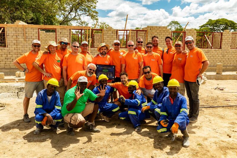 Fathers And Kids Camping have branched out from weekend trips into the desert, to volunteer to build schools in Africa. Courtesy, Fathers And Kids Camping