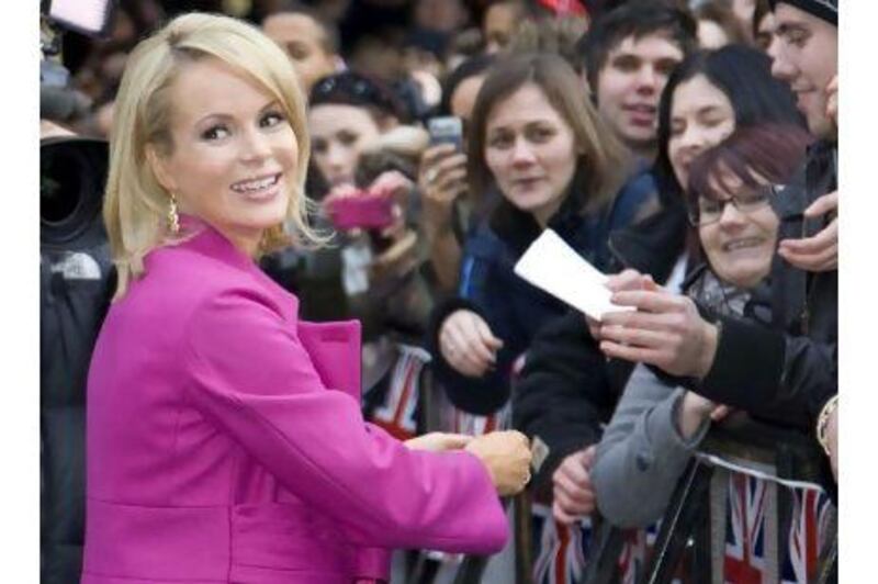 The British actress Amanda Holden arrives at the 'Britain's Got Talent' auditions in London. A reader deplores the excessive social media traffic about her stillborn son. John Phillips / UK Press