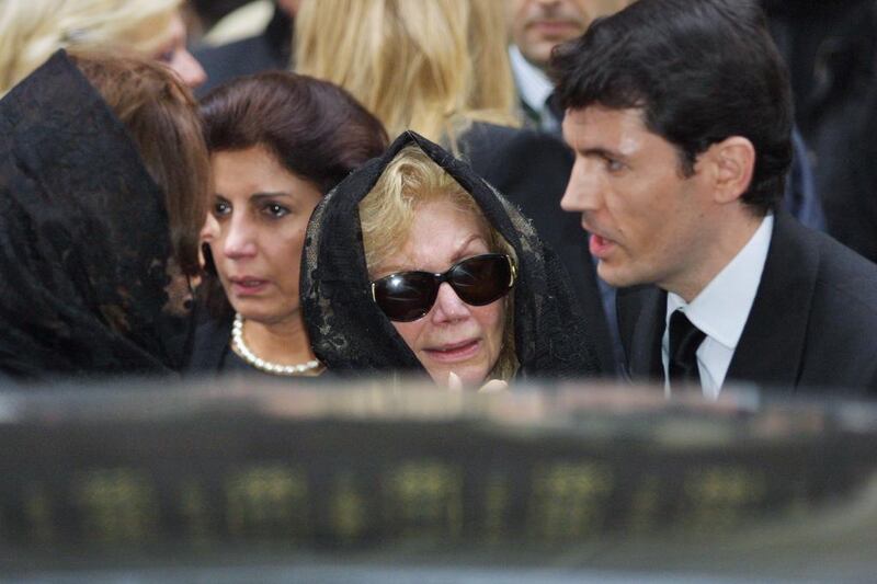 Princess Ashraf (centre), the sister of the late shah of Iran, leaves the American Cathedral in Paris on November 6, 2001 following funeral services for princess Soraya Esfiandiary-Bakhtiary, the second wife of the late Iranian monarch. AFP