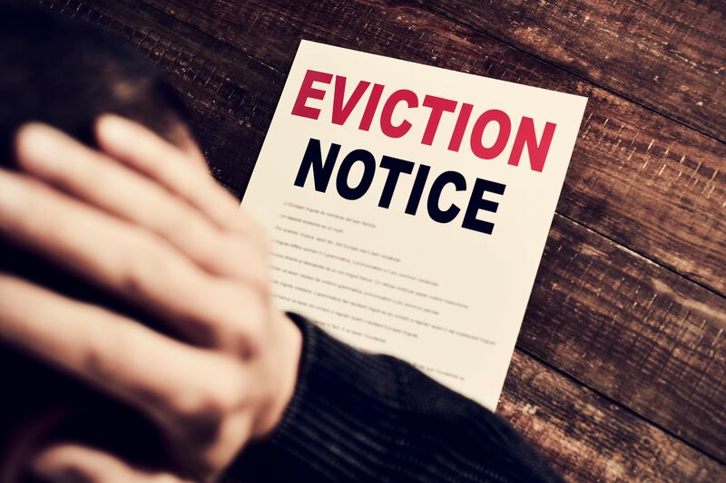 Often a courier company pastes the eviction notice on the door of the property and this is then deemed delivered. Alamy