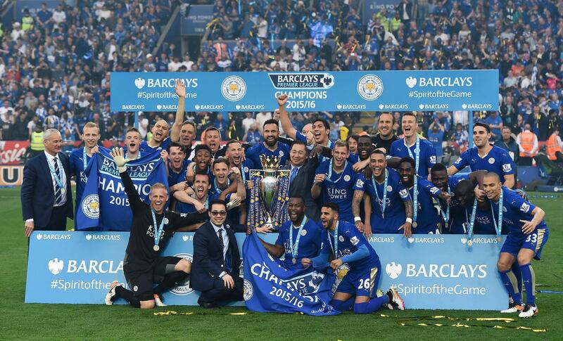 LEICESTER, ENGLAND - MAY 07:  Leicester City players celebrate the season champions with the Premier League Trophy after the Barclays Premier League match between Leicester City and Everton at The King Power Stadium on May 7, 2016 in Leicester, United Kingdom.  (Photo by Laurence Griffiths/Getty Images)