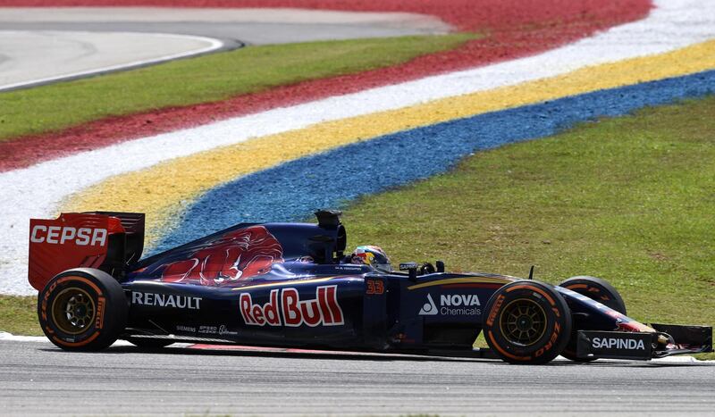 Scuderia Toro Rosso's Belgian-Dutch driver Max Verstappen races through a corner during the Formula One Malaysian Grand Prix in Sepang on March 29, 2015. AFP PHOTO / MOHD RASFAN (Photo by MOHD RASFAN / AFP)