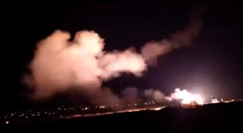 This frame grab from a video provided by the Syrian official news agency SANA shows missiles flying into the sky near Damascus, Syria, Tuesday, Dec. 25, 2018. Israeli warplanes flying over Lebanon fired missiles toward areas near the Syrian capital of Damascus late Tuesday, hitting an arms depot and wounding three soldiers, Syrian state media reported, saying that most of the missiles were shot down by air defense units. (SANA via AP)