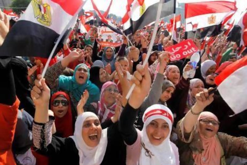 Egyptian women react to the military's 48-hour ultimatum for President Mohammed Morsi and opposition leaders to reach an agreement.