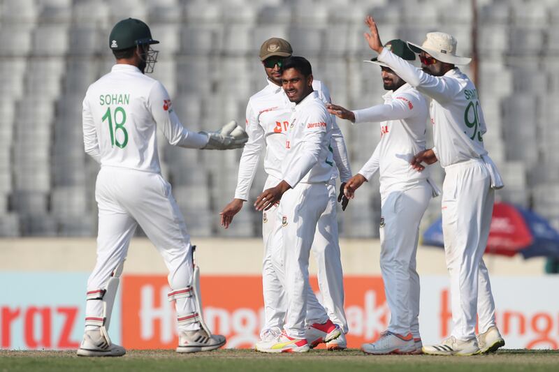 Bangladesh's Mehidy Hasan Miraz, centre, celebrates with teammates after the dismissal of India's Rishabh Pant in the second Test in Mirpur on Friday, December 23, 2022. AP