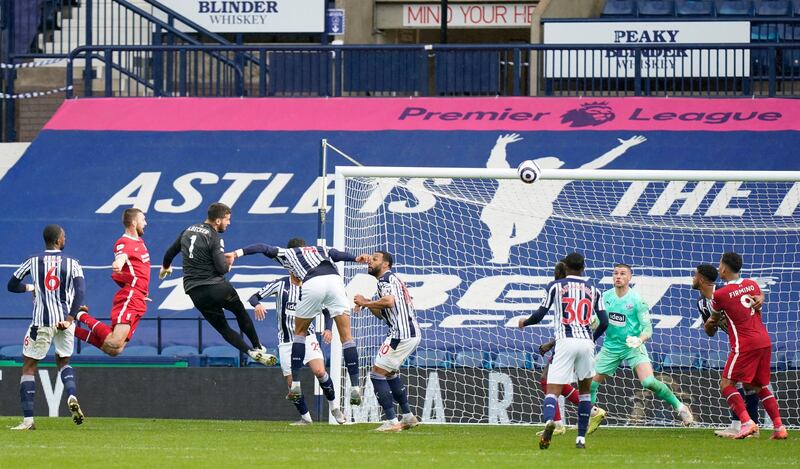 Alisson heads home Liverpool's winner at The Hawthorns. Reuters