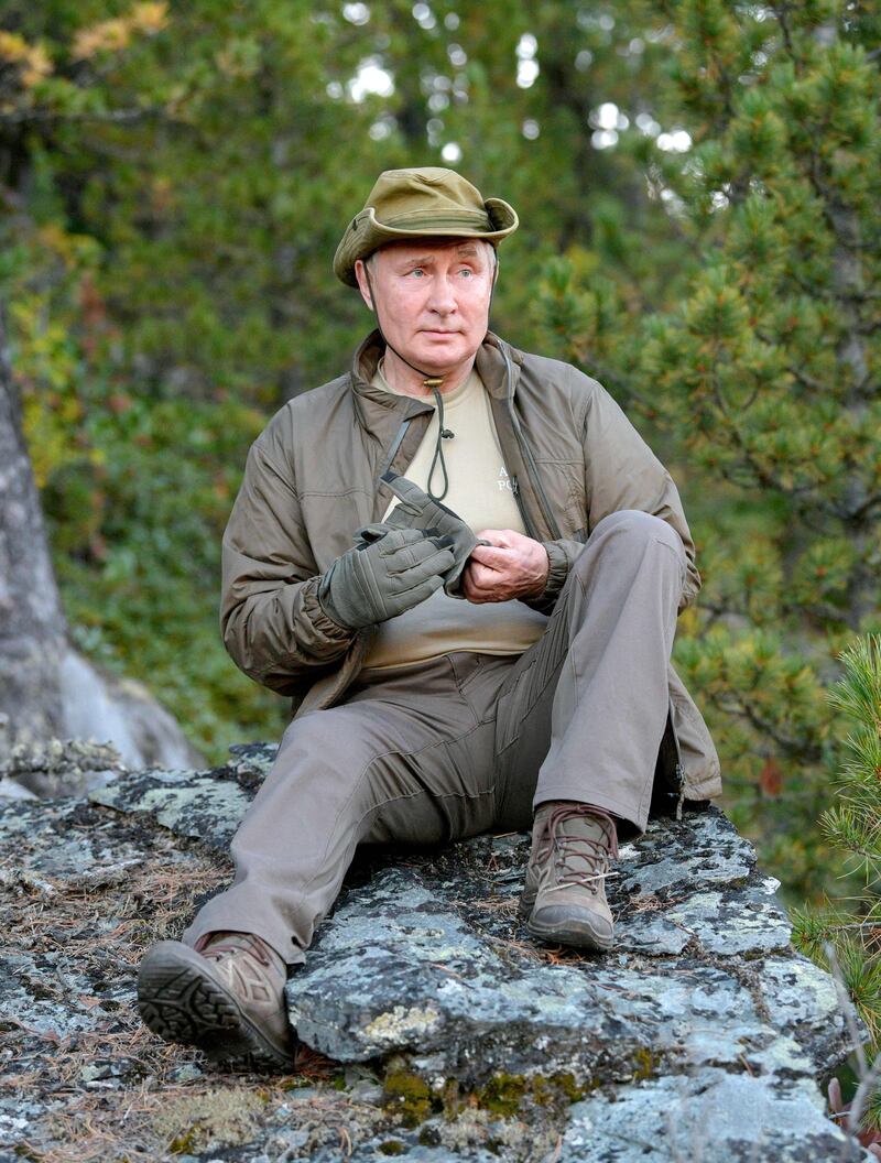 Mr Putin has cultivated a macho image, appealing to many Russians. AFP