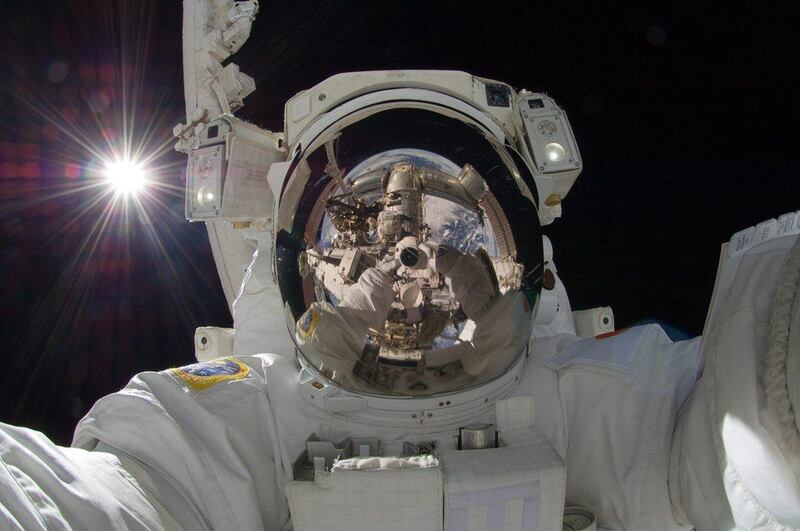 Japan Aerospace Exploration Agency astronaut Aki Hoshide takes a selfie during a spacewalk. at the International Space Station in 2012. The word selfie was named word of the year by Oxford Dictionaries. Picture by Nasa / AP Photo