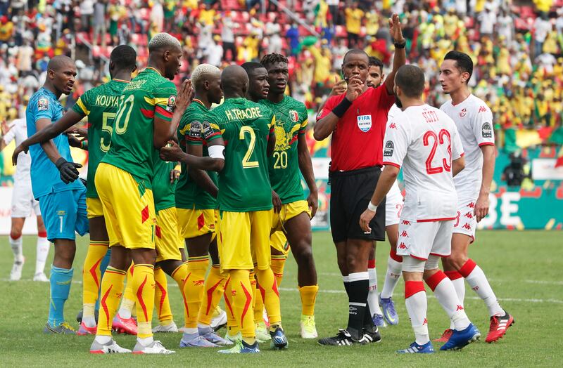 Referee Janny Sikazwe gives Tunisia a penalty. Reuters