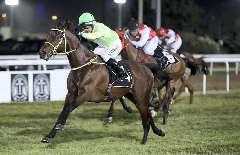 ABU DHABI , UNITED ARAB EMIRATES , DEC 10  – 2017 :-  Al Tiryaq ( AE )    ridden by Sam Hitchcott ( no 4 )  won the third race 1600 m held at Abu Dhabi Equestrian Club in Abu Dhabi. (Pawan Singh / The National) Story by Amith