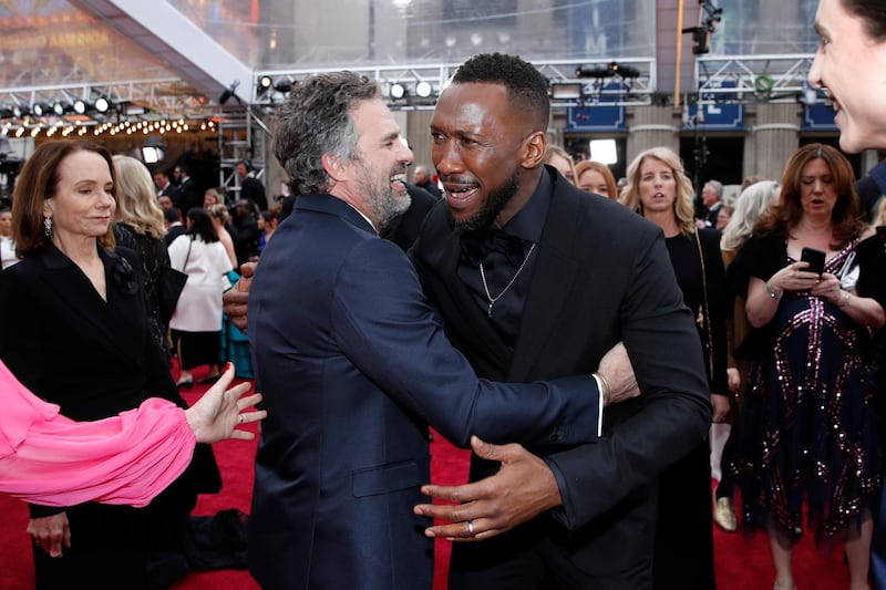 Mark Ruffalo and Mahershala Ali embrace on the red carpet during the Oscars arrivals at the 92nd Academy Awards in Hollywood, Los Angeles, California. Reuters
