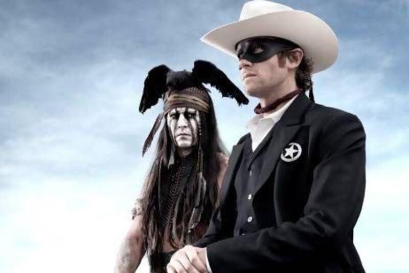 Johnny Depp as Tonto, left, and Armie Hammer as The Lone Ranger. AP Photo