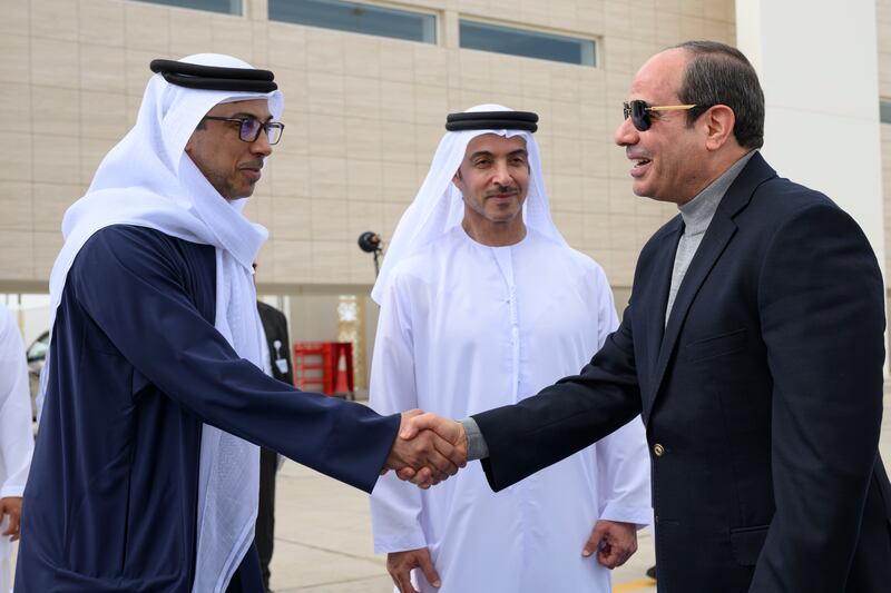 Sheikh Mansour bin Zayed, Deputy Prime Minister and Minister of the Presidential Court, left, receives Mr El Sisi.  Seen with Sheikh Hazza bin Zayed, Deputy Chairman of Abu Dhabi Executive Council, centre

