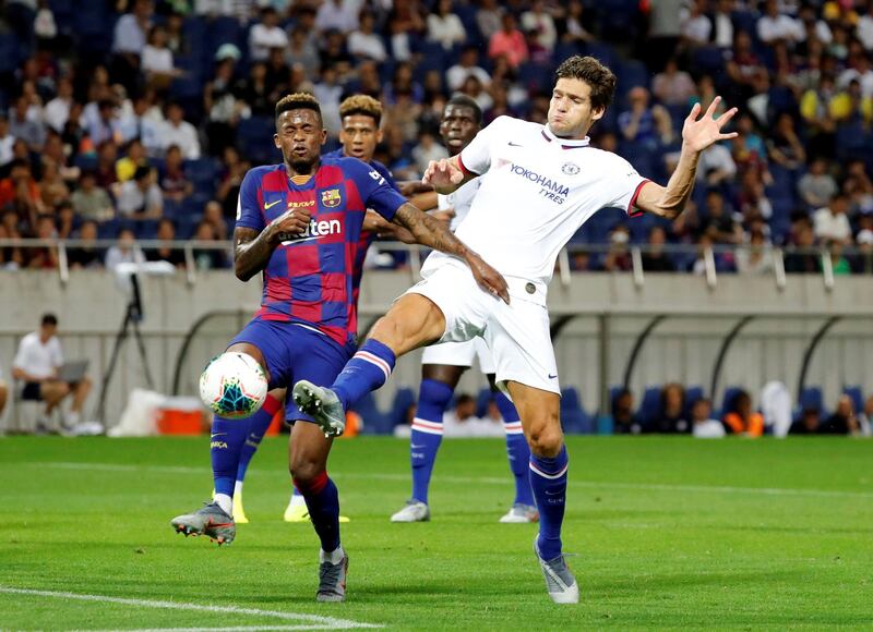 Barcelona's Nelson Semedo in action with Chelsea's Marcos Alonso. Reuters