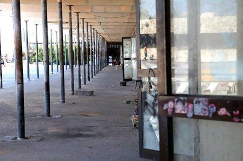 Abandoned market stalls line the walls at the Iranian Souq. Razan Alzayani / The National