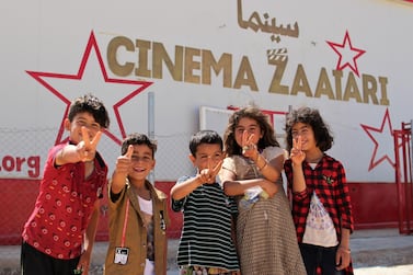 Syrian refugee children outside the newly opened movie theatre. Courtesy Unicef