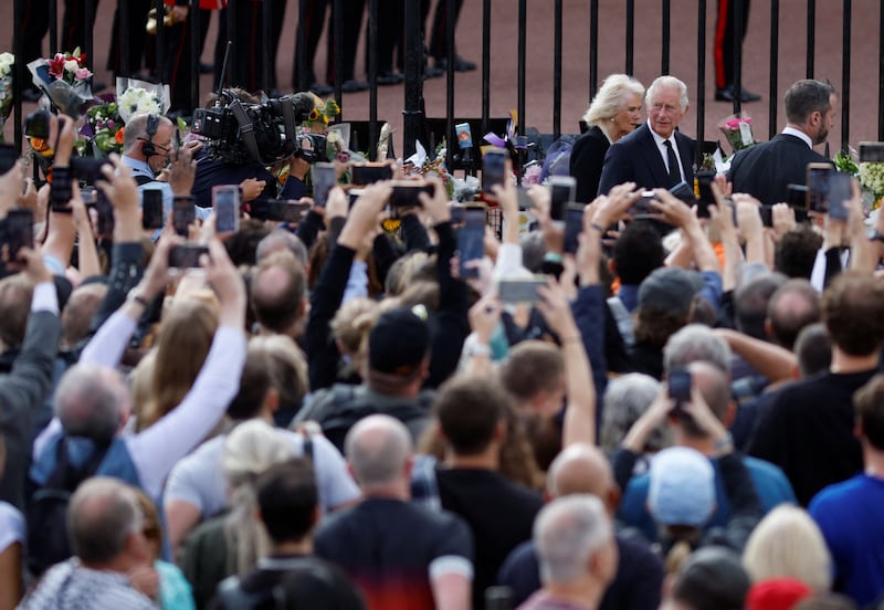 King Charles and Queen Consort Camilla surrounded by crowds of well-wishers in London. Reuters