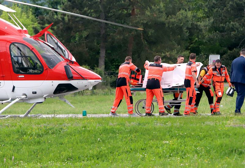 Mr Fico was taken to hospital by helicopter. AP