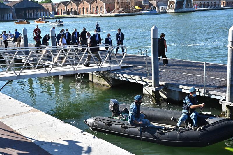 Italian Navy personnel patrol the waters of Venice amid heightened security for the G20 gathering.
