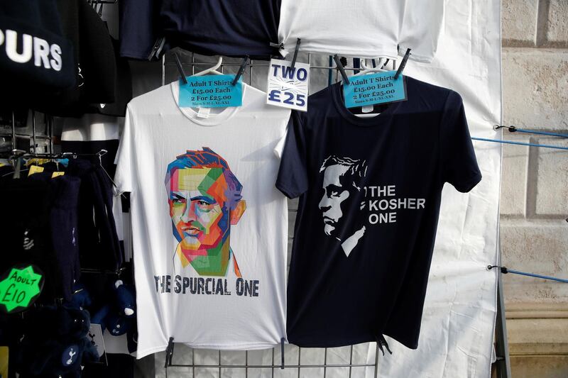 T-shirts of Tottenham Hotspur manager Jose Mourinho for sale at a merchandise kiosk. Reuters