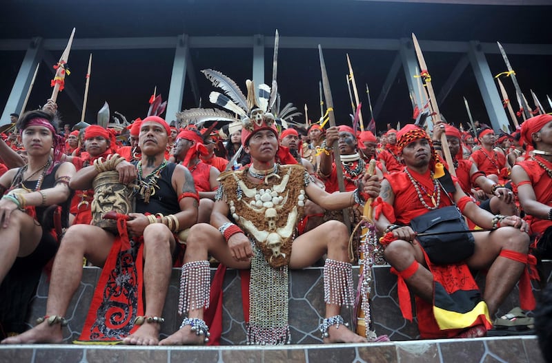 Members of the Dayak tribe attending the Gawai Dayak Festival in Pontianak, West Kalimantan. The Gawai Dayak festival by Dayak tribes in Kalimantan is a thanksgiving festival to celebrate their harvest. Louis Anderson / AFP