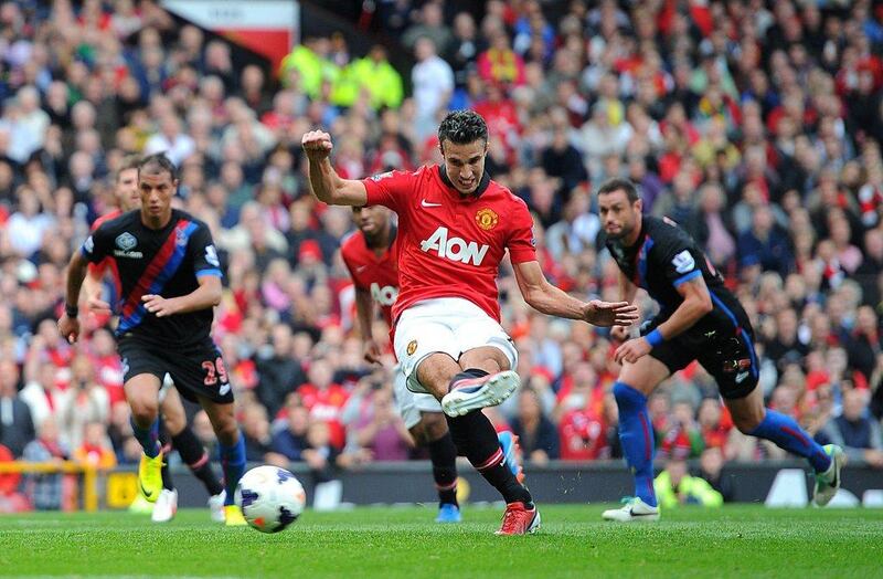 Robin van Persie is continuing his goal-scoring form from the past two seasons. Martin Rickett / AP Photo