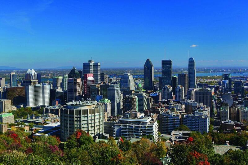 Montreal as viewed from Mont Royal. The city’s internationalism is flavoured by a global variety of immigrant communities. Calle Montes / Photononstop / Corbis