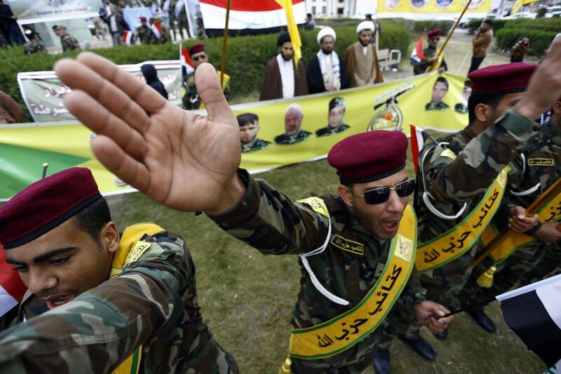 Shiite Hizbollah fighters gather in Iraq's holy central city of Najaf on February 20, 2015, ahead of relocating to the front lines. Haidar Hamdani/AFP Photo

