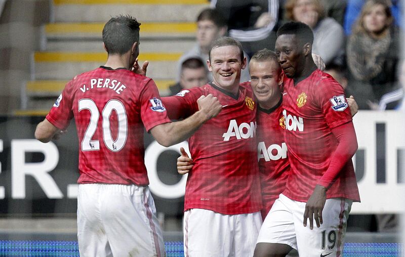 Manchester United's English midfielder Tom Cleverley (2nd R) celebrates scoring their third goal with team-mates during the English Premier League football match between Newcastle United and Manchester United at Sports Direct Arena in Newcastle, north-east England on October 7, 2012. AFP PHOTO/GRAHAM STUART

RESTRICTED TO EDITORIAL USE. No use with unauthorized audio, video, data, fixture lists, club/league logos or “live” services. Online in-match use limited to 45 images, no video emulation. No use in betting, games or single club/league/player publications
 *** Local Caption ***  624746-01-08.jpg
